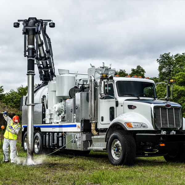 Vac-Con X-Cavator Truck being used for hydro excavation