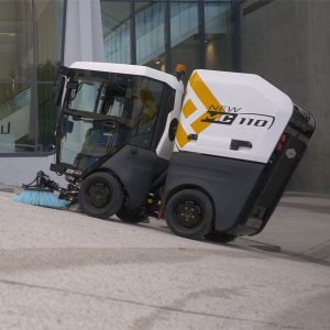 Mathieu MC110 Street Sweeper on Sidewalk