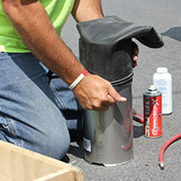 Worker using the Quicklock Pipe Repair System