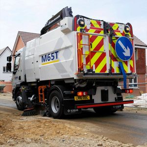 Scarab M65T Street Sweeper on Unpaved Road